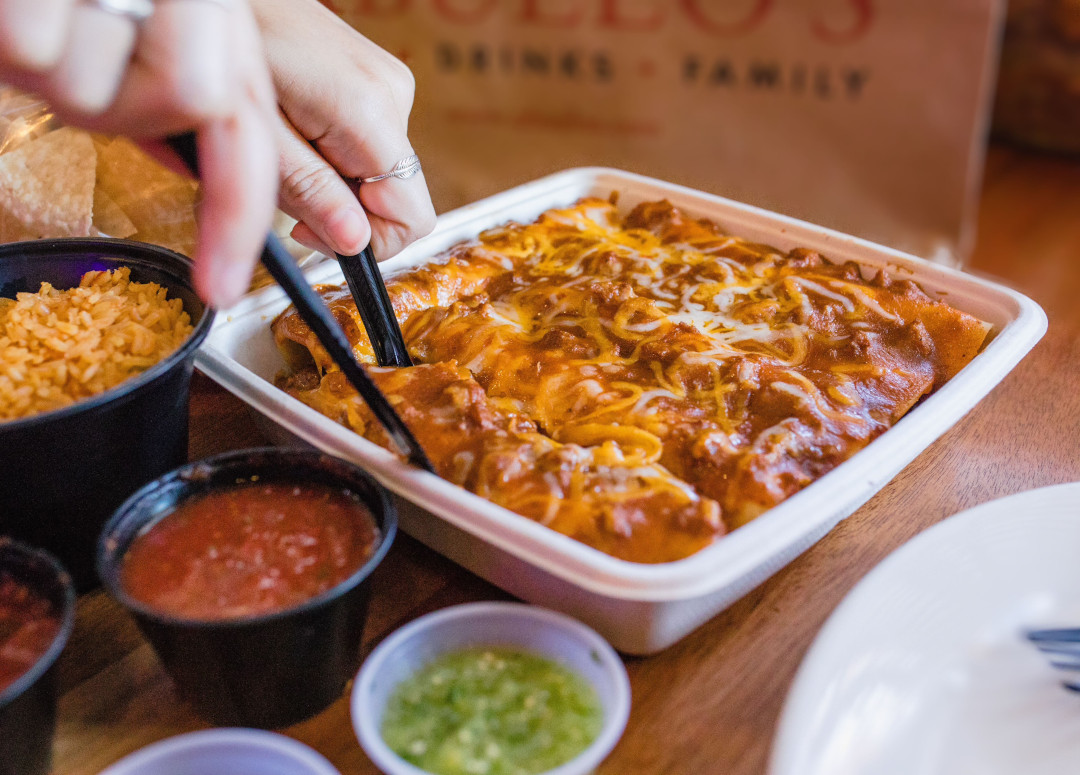 Curbside to-go tray of Abuelo's Enchiladas