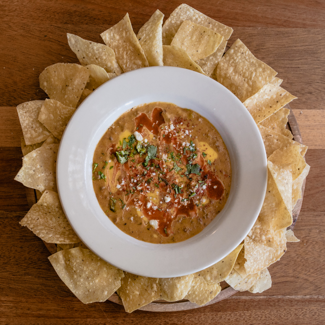 Queso dip and tortilla chips at Abuelo's
